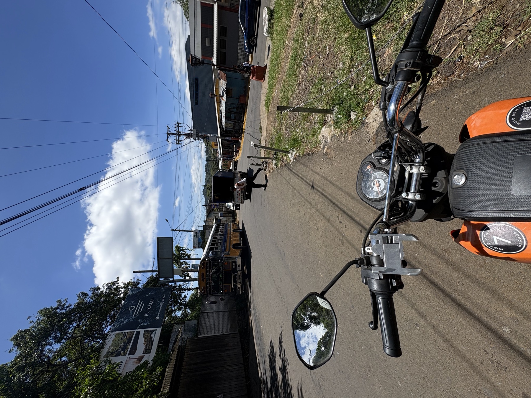 Motorbike point of view on a Salvadoran road